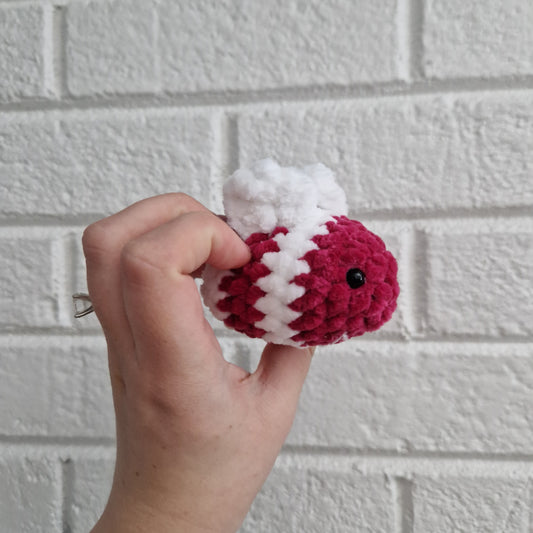 Raspberry and white coloured chunky crochet bee keyring