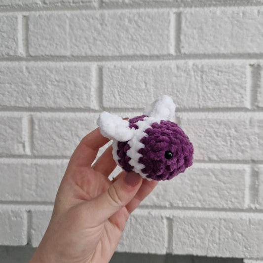 Purple and white coloured chunky crochet bee keyring