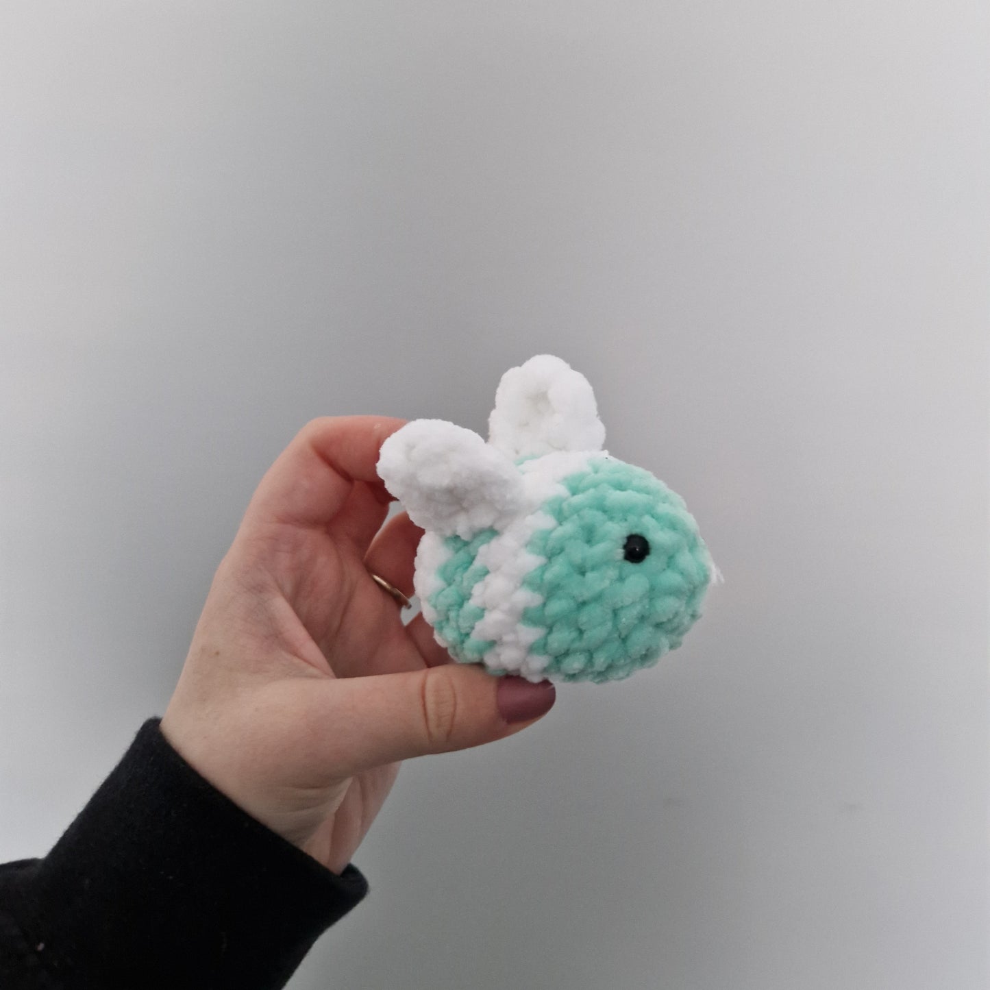 Mint and white coloured chunky crochet bee keyring