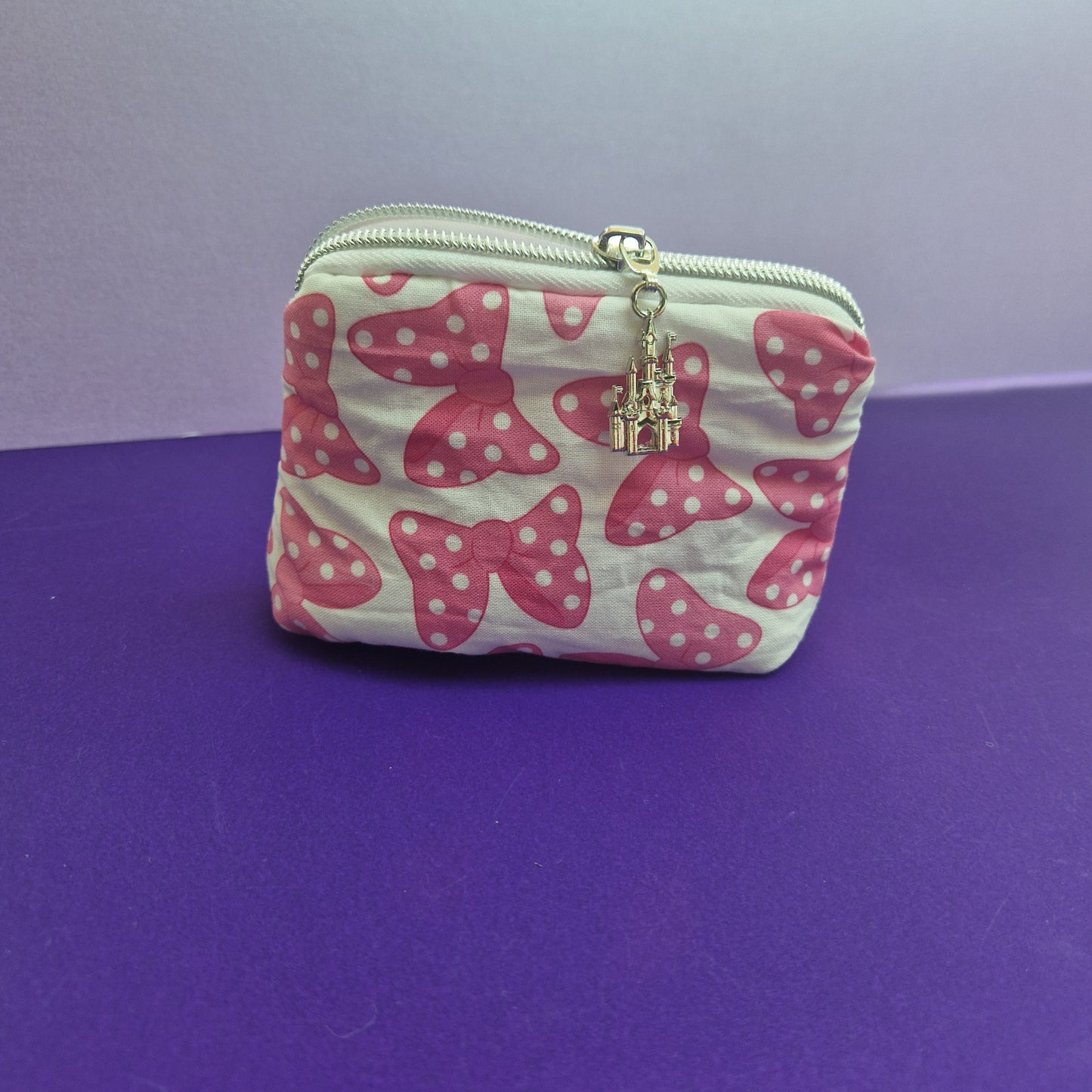 Bow lined mini triangle shaped pouch cosmetic bag with zipper