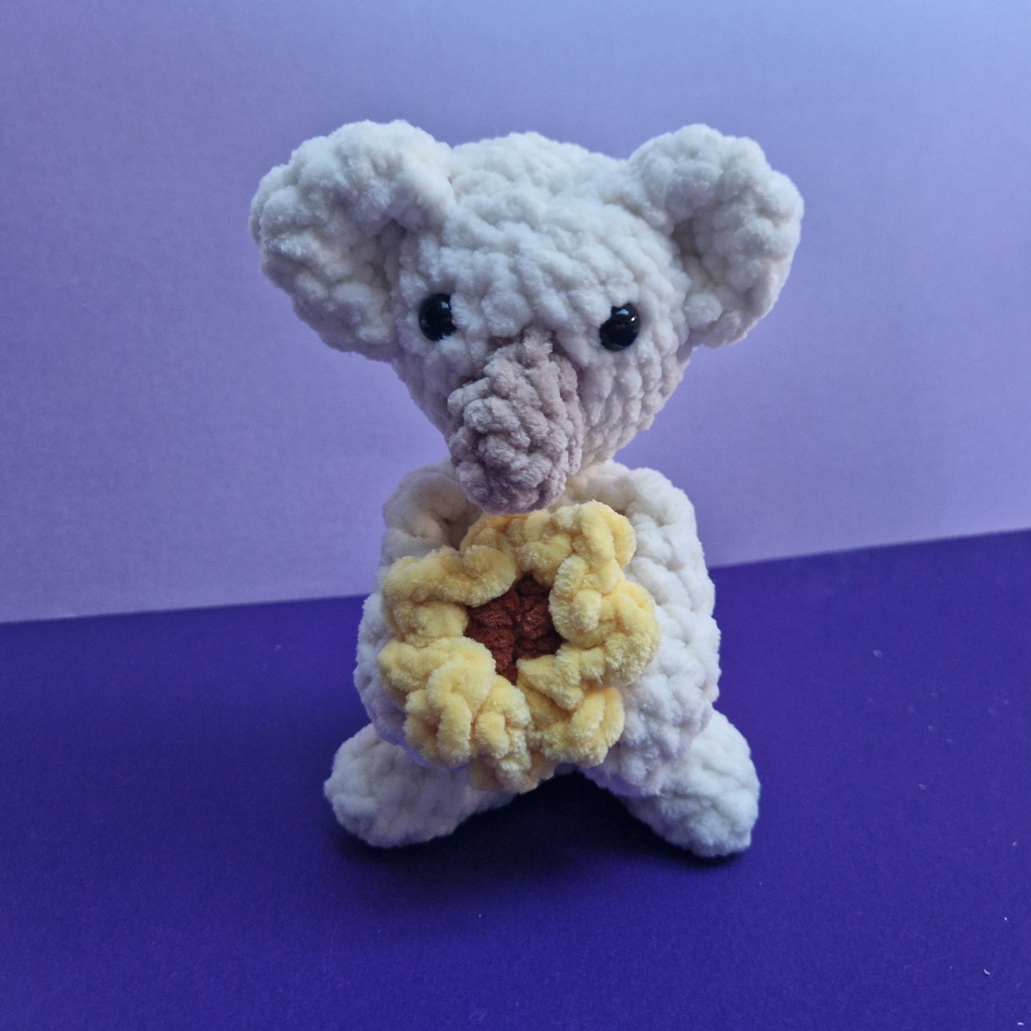 Crochet Chunky, super soft cream koala holding a sunflower