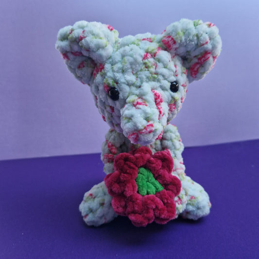 Crochet chunky, super soft green floral koala holding a sunflower