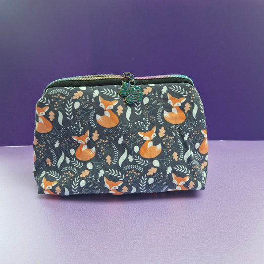 Sleeping Fox lined triangle cosmetic bag with rose zipper pull