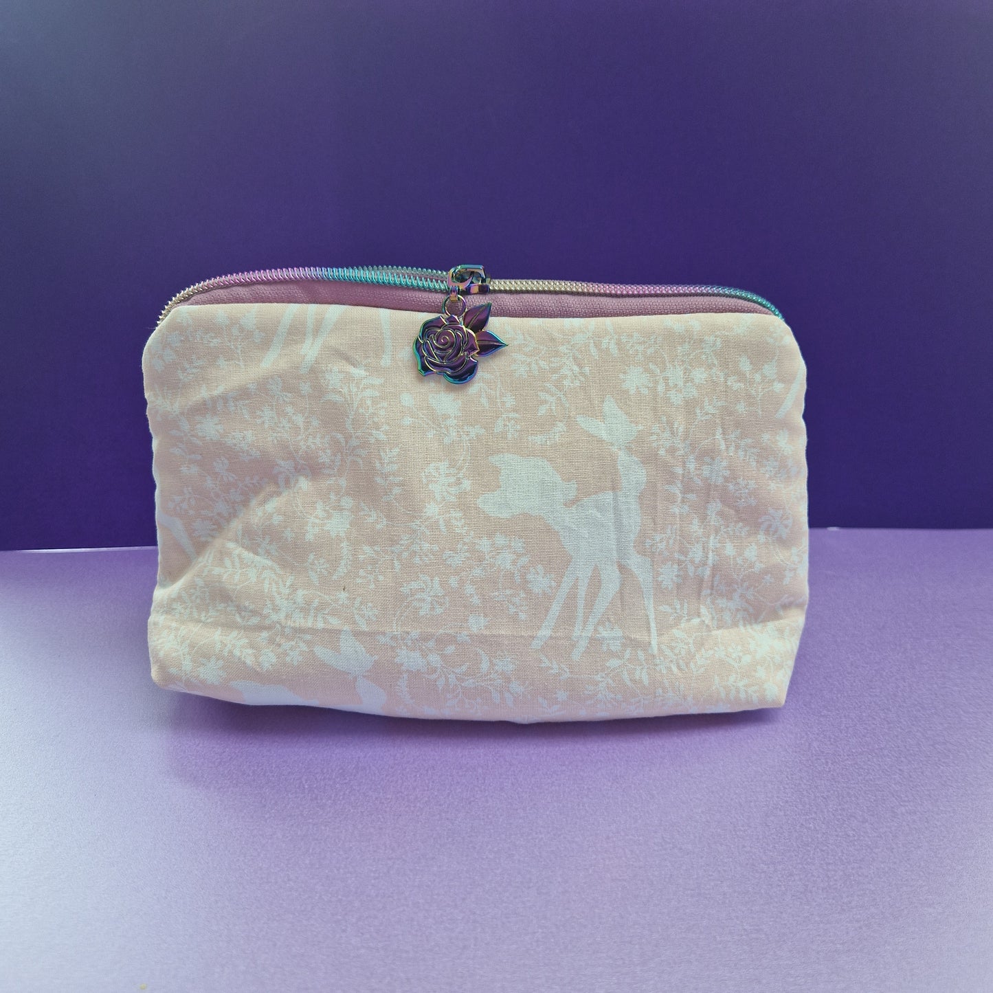 Young Prince Deer lined triangle cosmetic bag with rose zipper pull