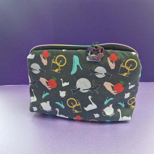 Storybook lined triangle cosmetic bag with pirate ship zipper pull