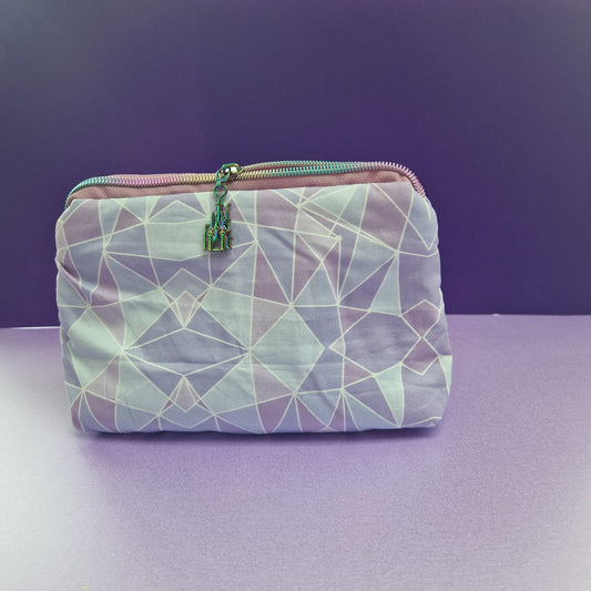 Purple Wall lined triangle cosmetic bag with castle pull