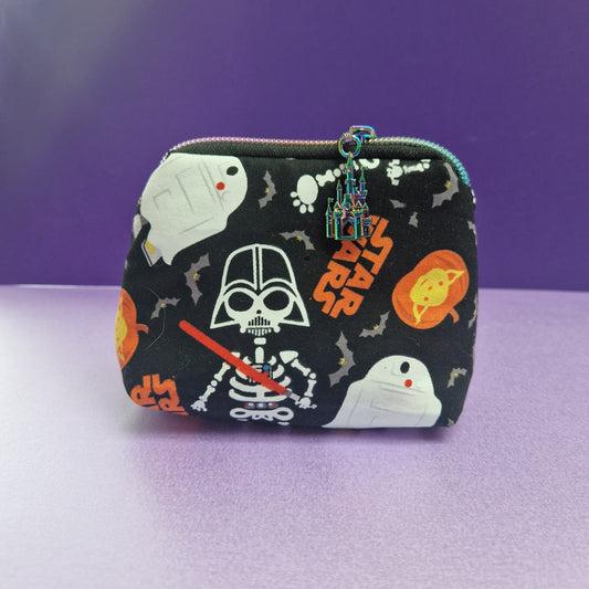 Glow in the Darkside mini triangle shaped pouch cosmetic bag with castle zipper pull