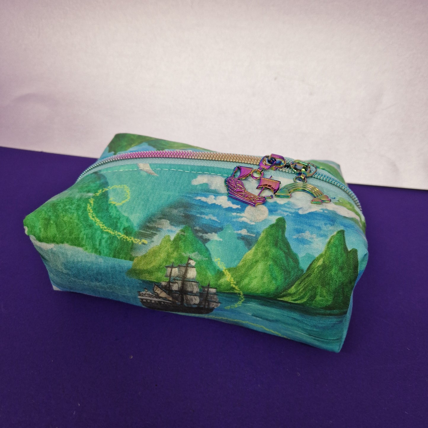 Neverland boxy pouch cosmetic bag with a pirate ship and rainbow zipper pull