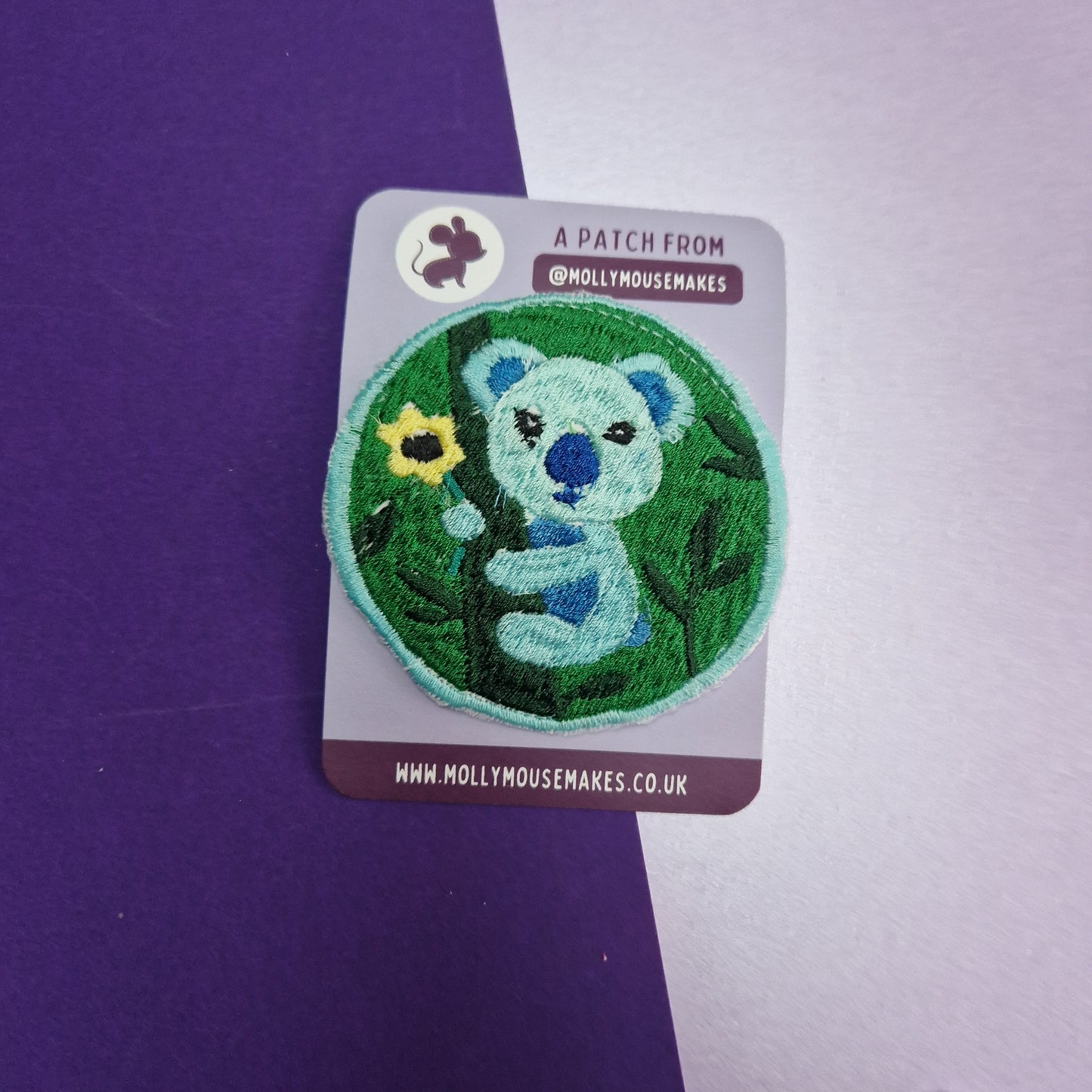 Practically perfect koala iron-on embroidered patch