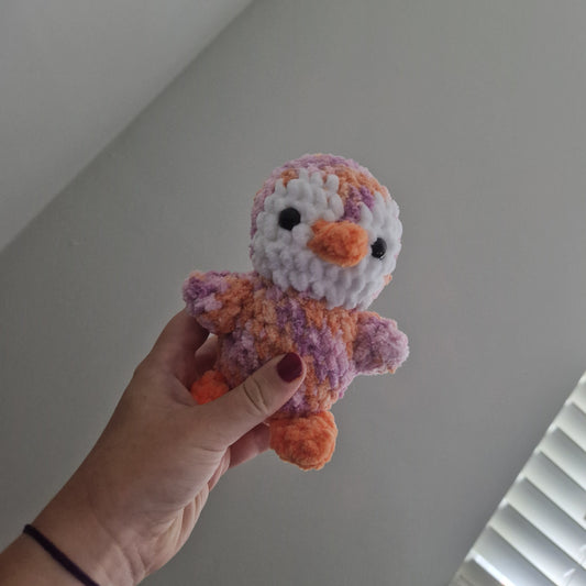 Orange and pink penguin crochet plushie