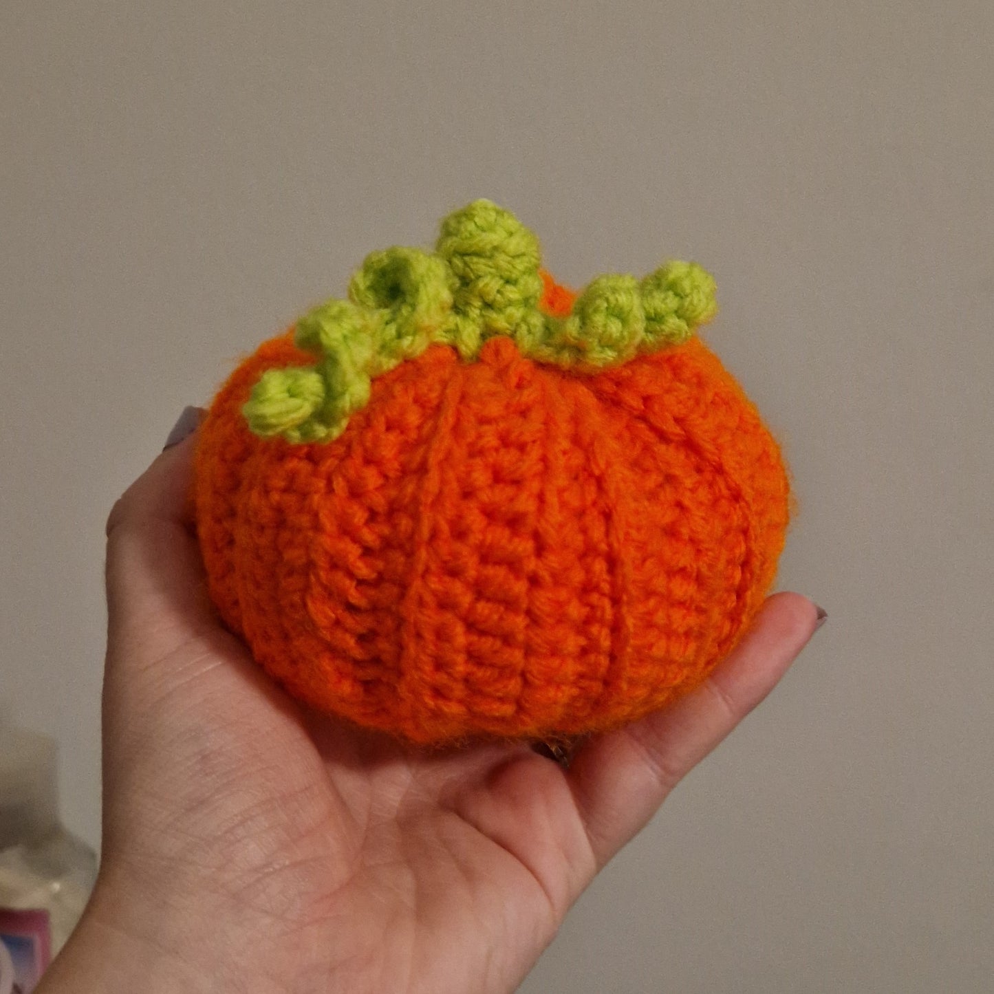 Orange pumpkin crochet plushie decor