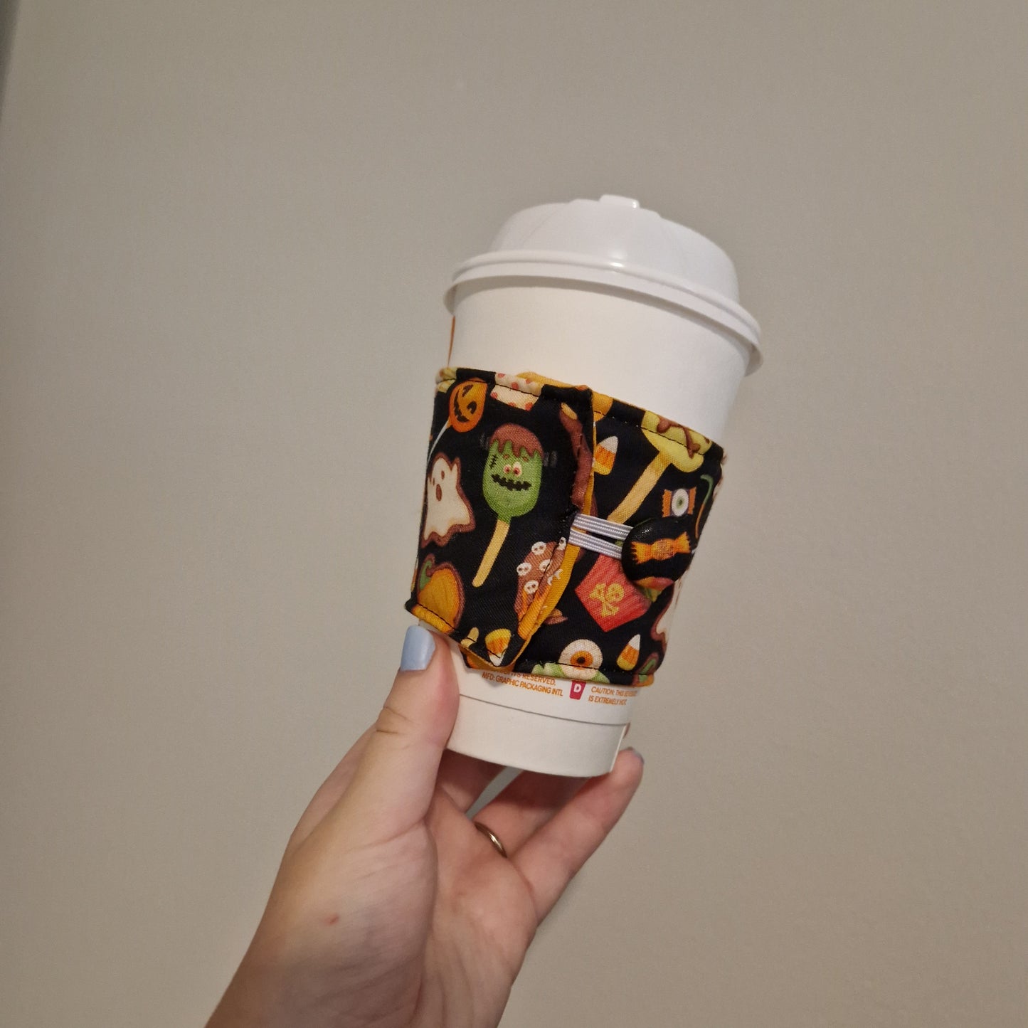 Trick or treat cup blanket for hot or cold drinks