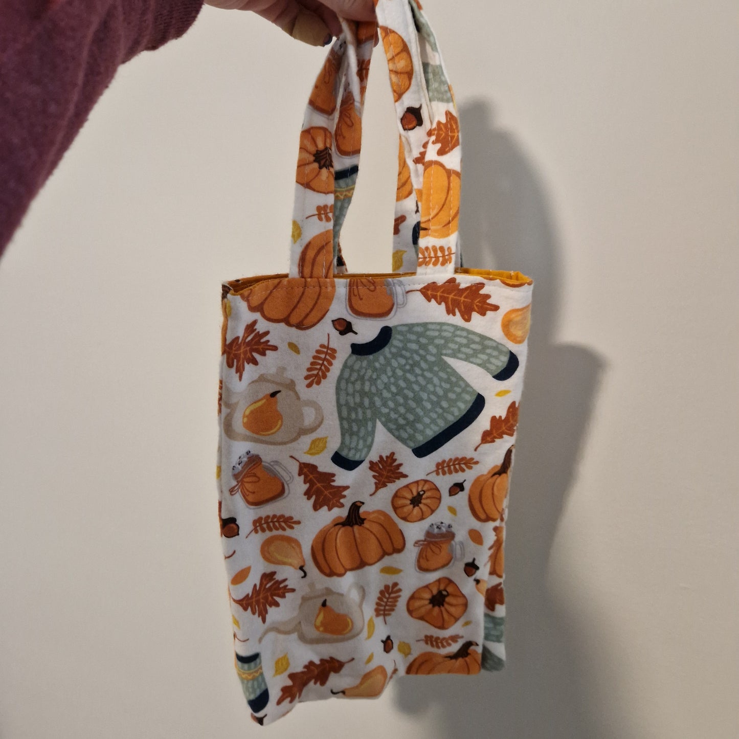 Sweater Weather fabric trick or treat lined tote bag