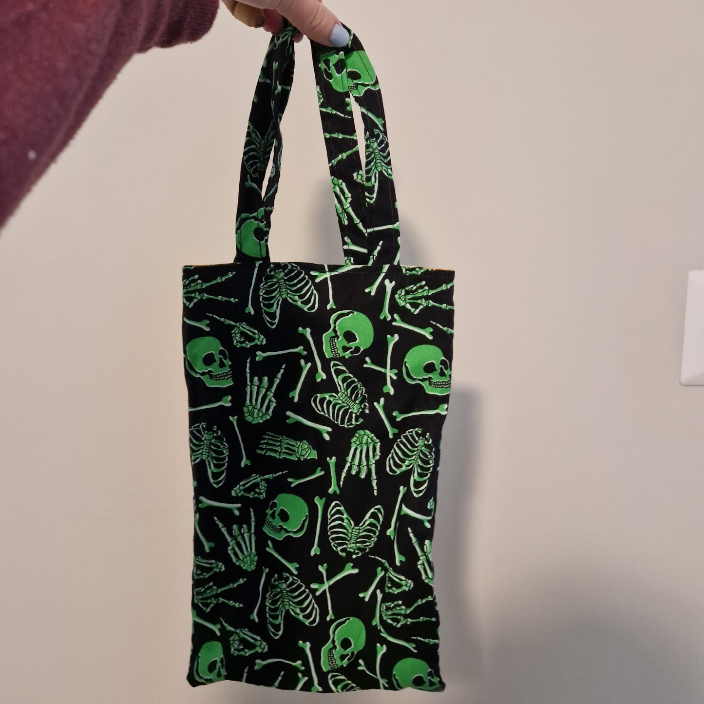 Glow in the dark skeleton fabric trick or treat lined tote bag