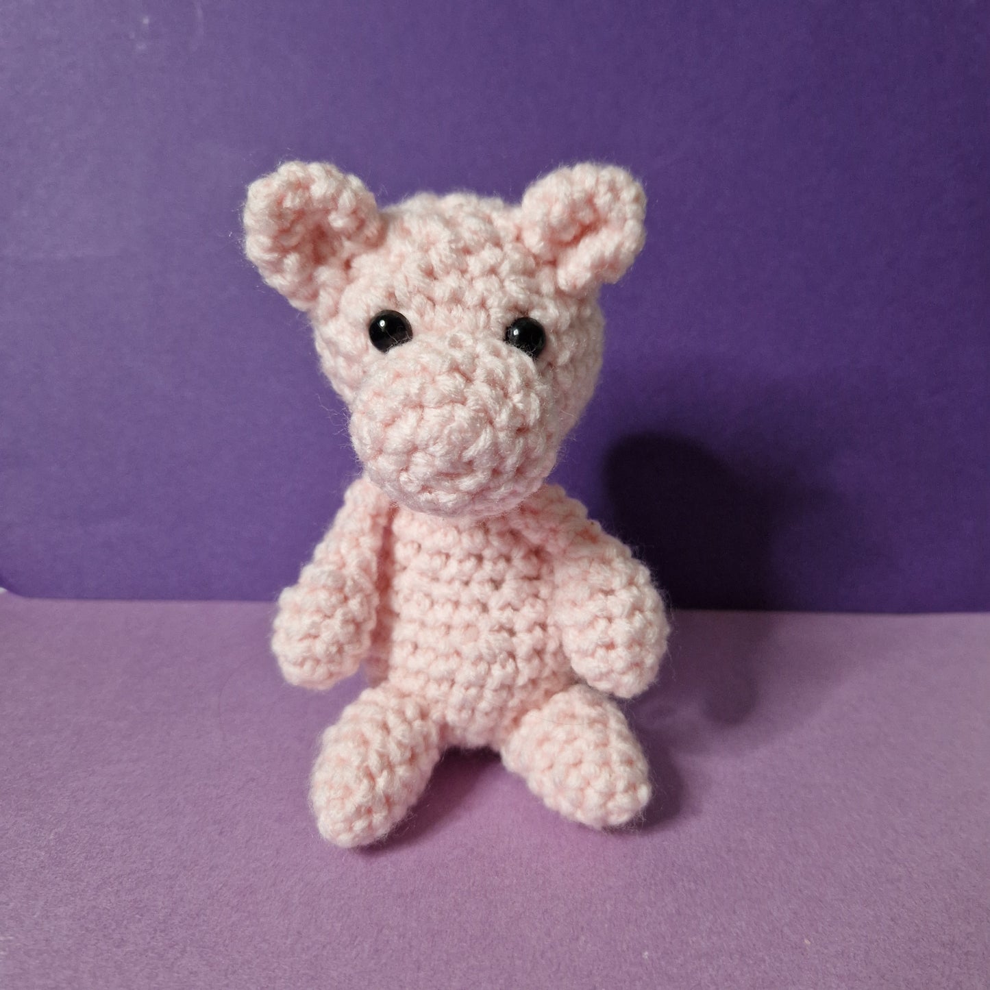 Pink crochet sitting hippo