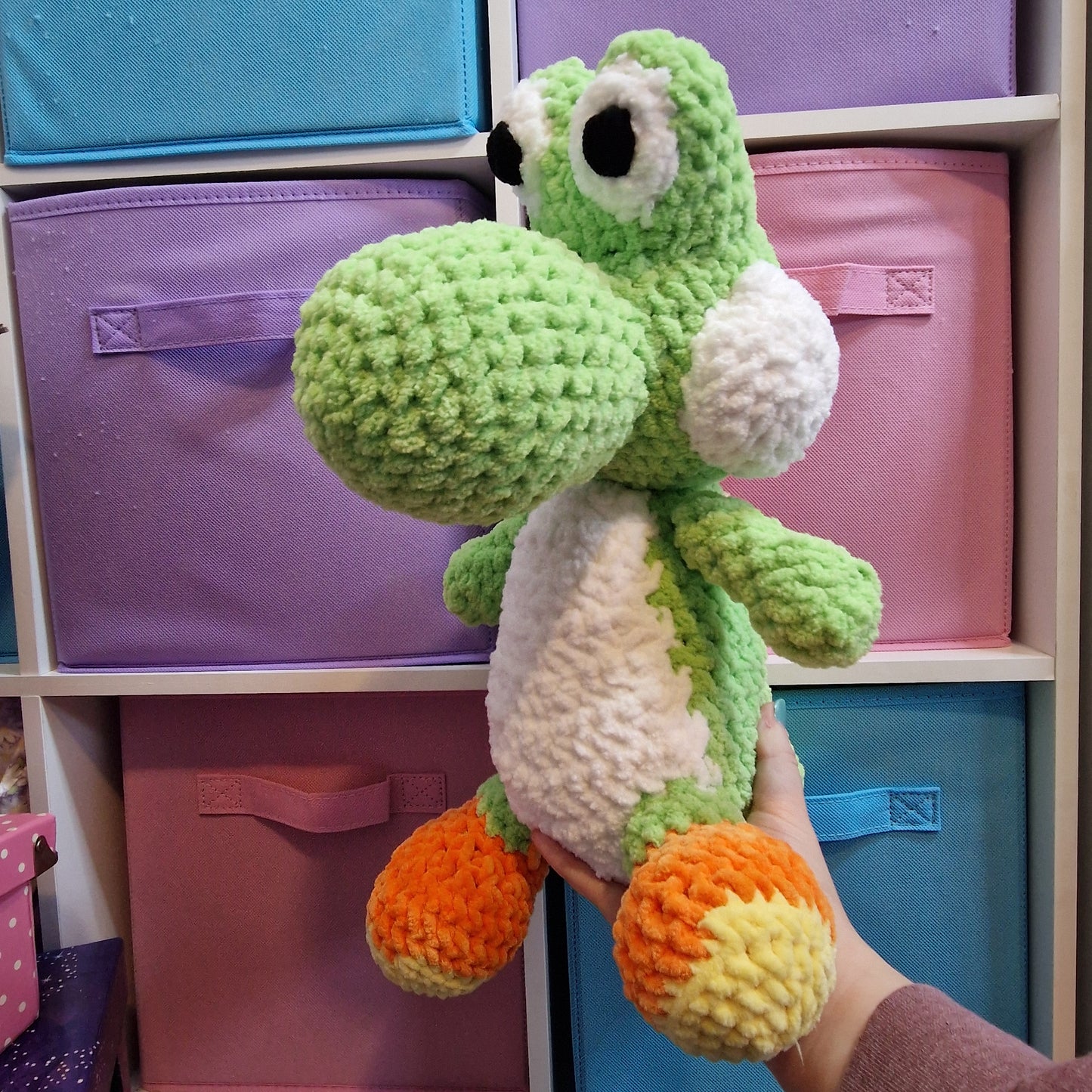 Large green dinosaur crochet plushie