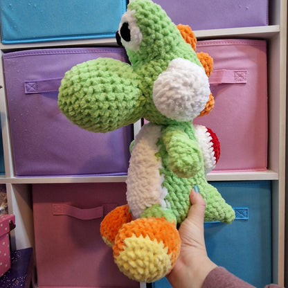 Large green dinosaur crochet plushie