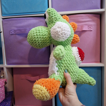 Large green dinosaur crochet plushie