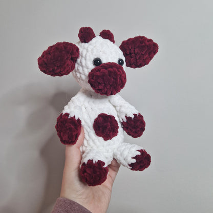 Red and white sitting cow crochet plushie