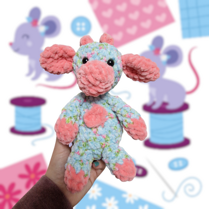 Pink and blue floral sitting cow crochet plushie