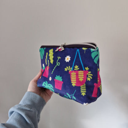 Plant themed lined velvet triangle cosmetic bag with matching zipper pull