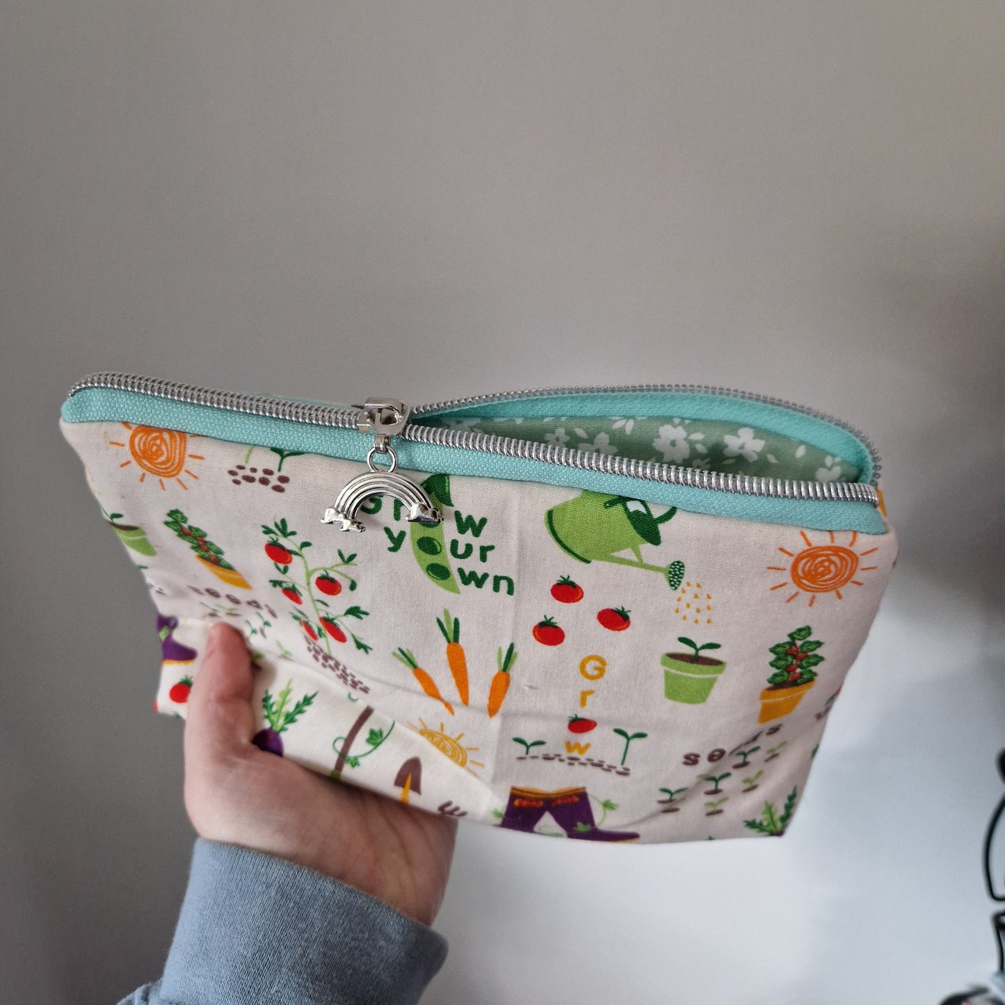 Vegetable Garden themed lined triangle cosmetic bag with matching zipper pull