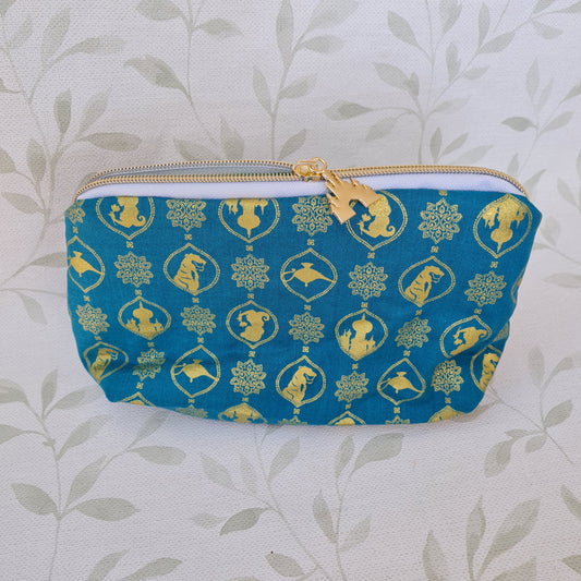 The Lamp Triangle cosmetic bag with zipper pull - Cave of Wonders