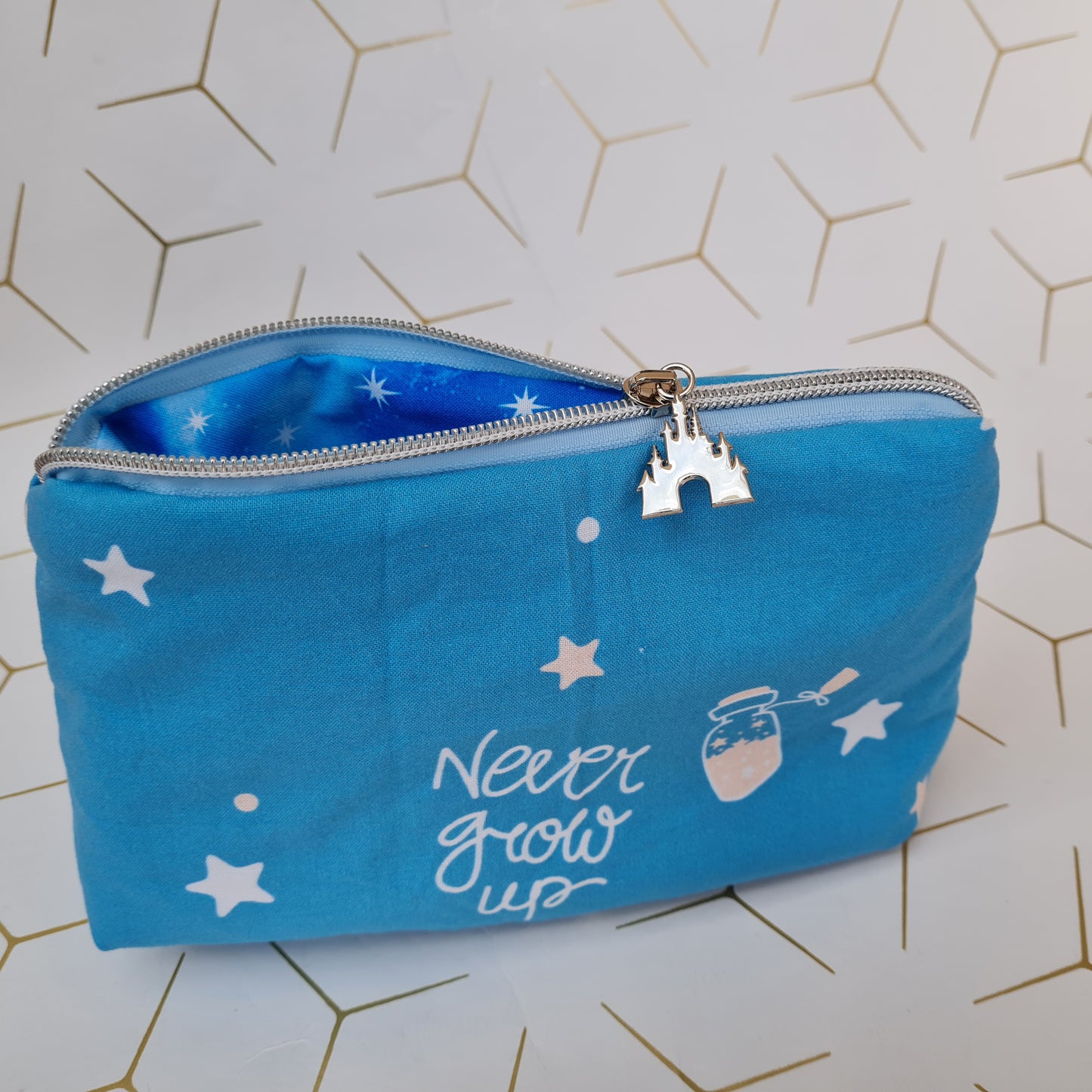 Never Grow Up Spell lined triangle cosmetic bag with zipper - The Lost Boy