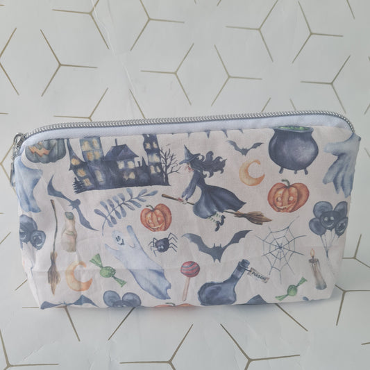 Spooky lined triangle cosmetic bag with zipper