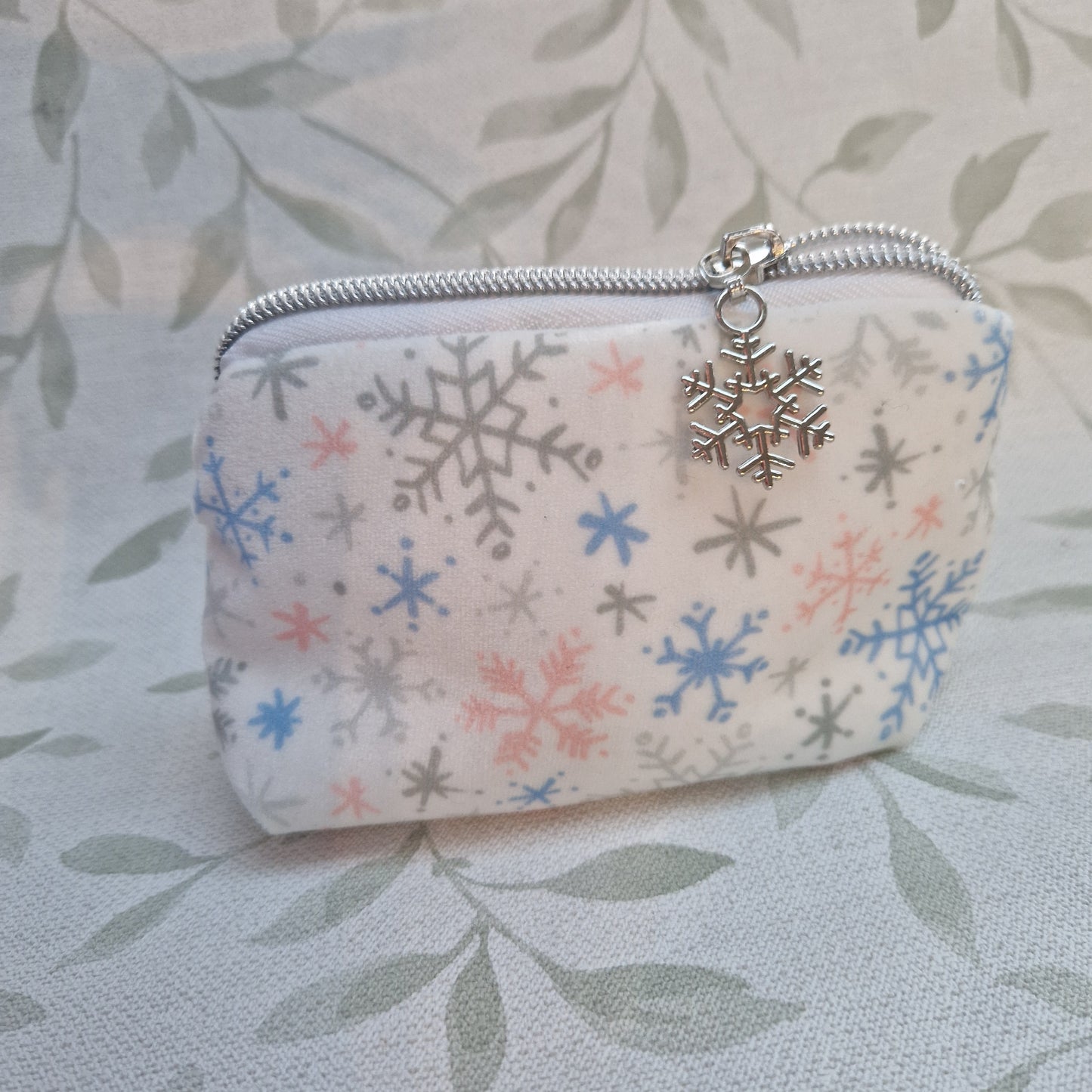 Mini velvet white snowflake lined triangle cosmetic bag with zipper