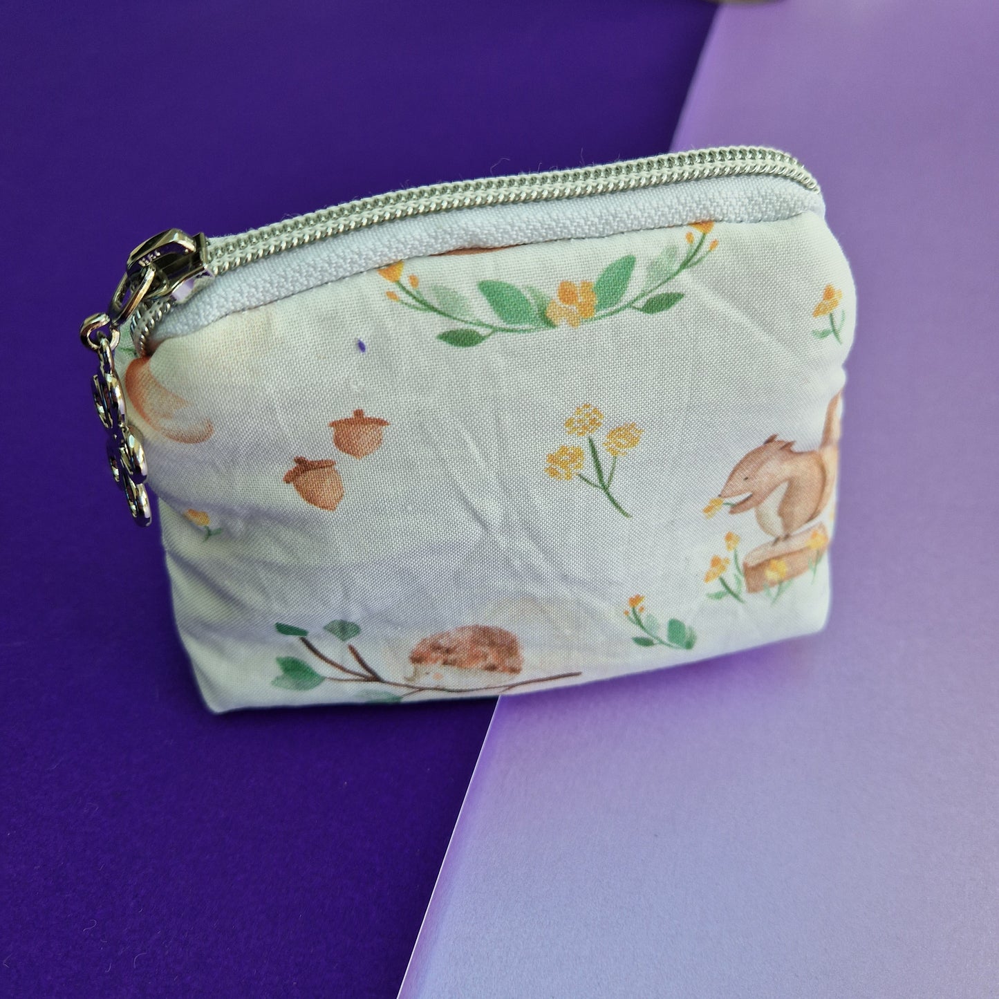 Woodland animal lined triangle cosmetic bag with zipper
