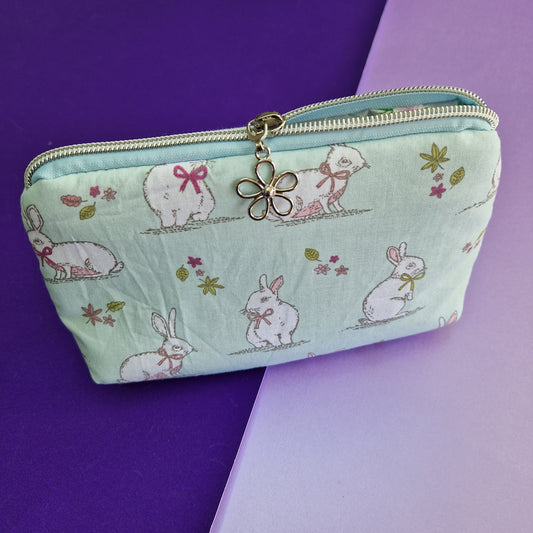 Rabbit lined triangle cosmetic bag with zipper